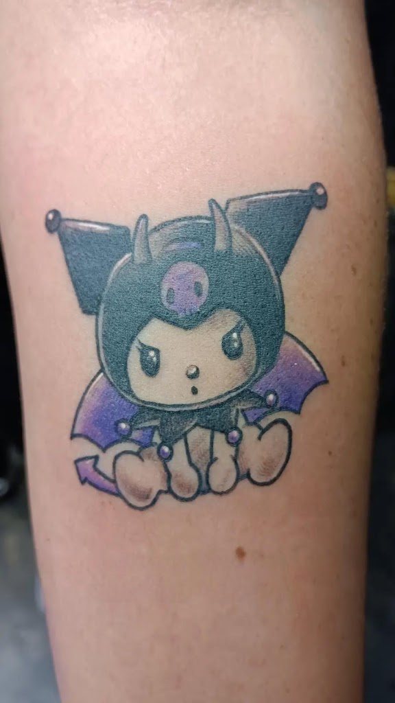 Carved in Gold Tattoo in El Paso