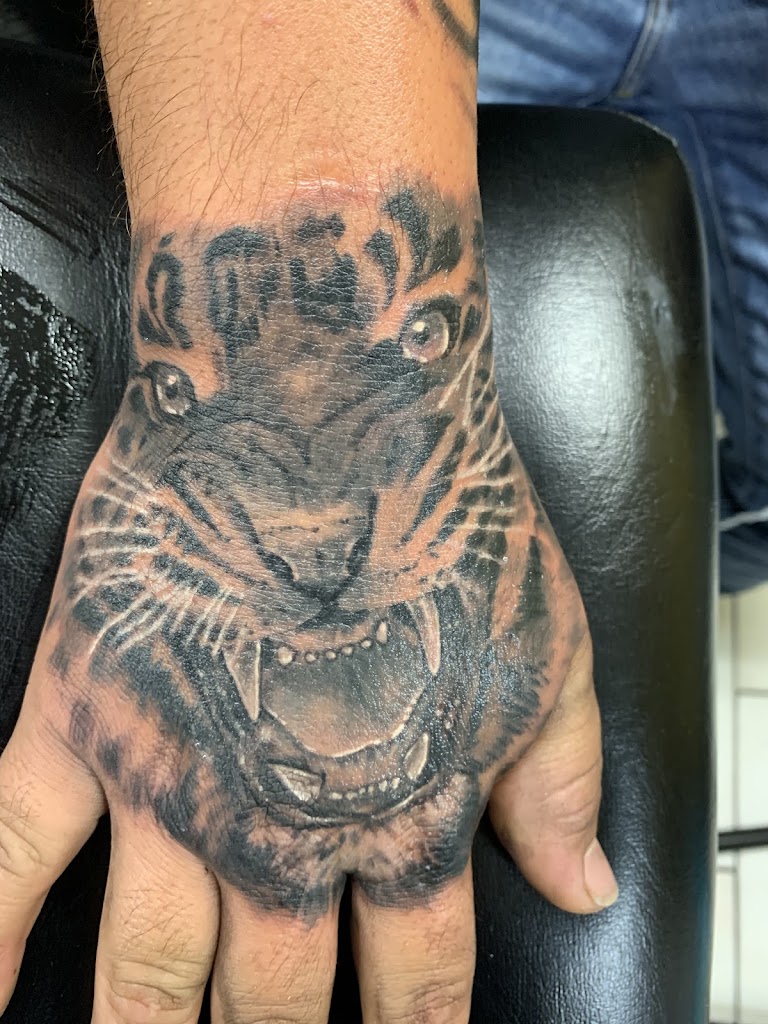 Phat Boys Tattoos & Body Piercings in Houston