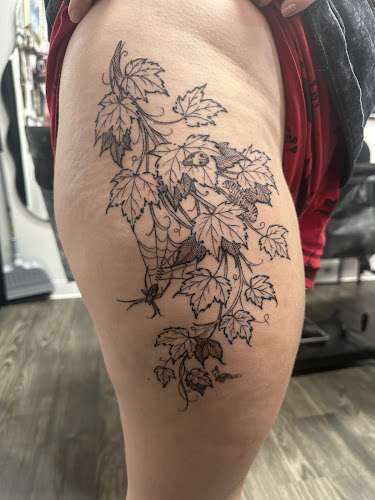 Rebel Muse Tattoo in Lewisville