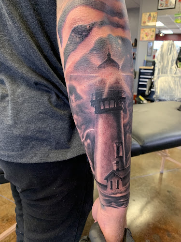 Smilin Rick's Tattoo in Denton