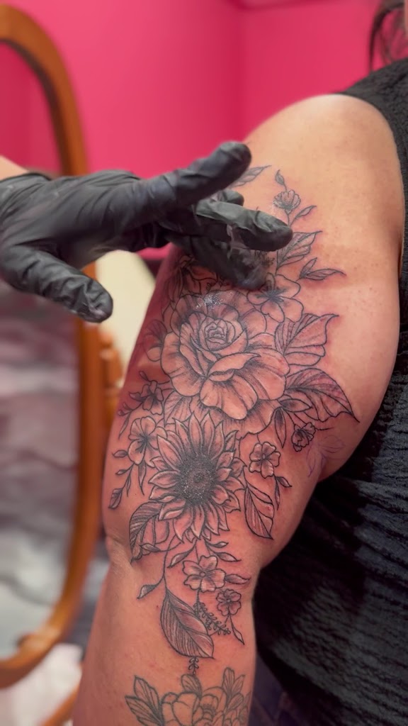 The pink elephant tattoo and piercing in Houston