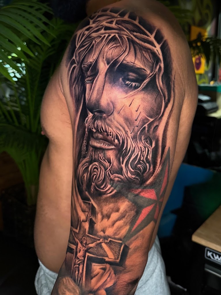 Tattoo work by Xquizitskillz Tattoo & JA's BARBERSHOP (1)